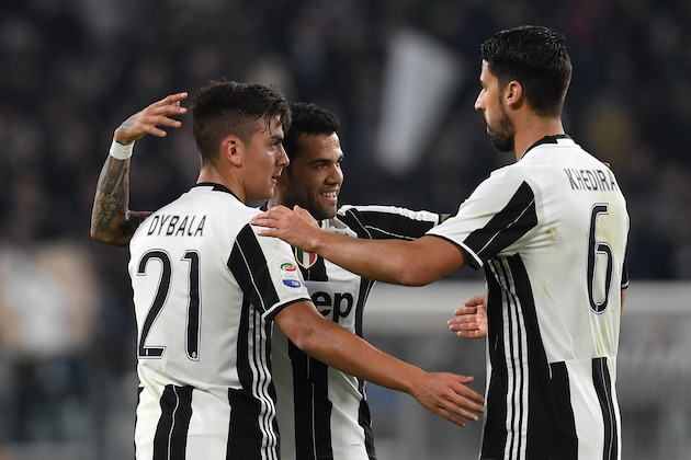 TURIN, ITALY - FEBRUARY 17:  Paulo Dybala (L) of Juventus FC celebrates his goal with team mates Daniel Alves (C) and Sami Khedira during the Serie A match between Juventus FC and US Citta di Palermo at Juventus Stadium on February 17, 2017 in Turin, Italy.  (Photo by Valerio Pennicino/Getty Images)