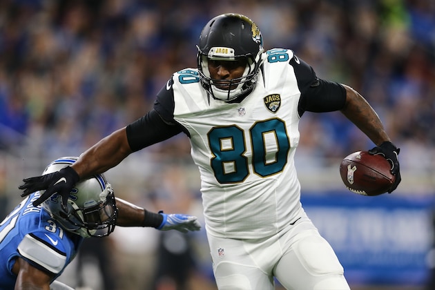 DETROIT, MI - NOVEMBER 20: Julius Thomas #80 of the Jacksonville Jaguars runs for yardage against Rafael Bush #31 of the Detroit Lions during second half action at Ford Field on November 20, 2016 in Detroit, Michigan. (Photo by Rey Del Rio/Getty Images)