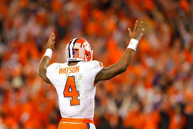 TAMPA, FL - JANUARY 09:  Quarterback Deshaun Watson #4 of the Clemson Tigers reacts after a touchdown by running back Wayne Gallman #9 (not pictured) during the fourth quarter against the Alabama Crimson Tide in the 2017 College Football Playoff National Championship Game at Raymond James Stadium on January 9, 2017 in Tampa, Florida.  (Photo by Kevin C. Cox/Getty Images)