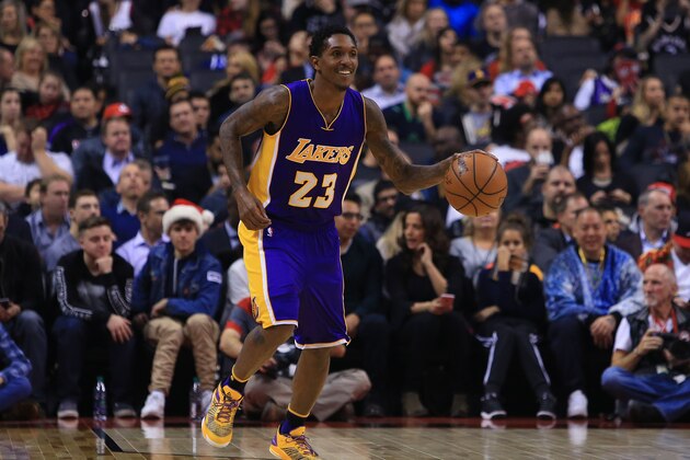 TORONTO, ON - DECEMBER 02:  Lou Williams #23 of the Los Angeles Lakers dribbles the ball during the first half of an NBA game against the Toronto Raptors at Air Canada Centre on December 2, 2016 in Toronto, Canada.  NOTE TO USER: User expressly acknowledges and agrees that, by downloading and or using this photograph, User is consenting to the terms and conditions of the Getty Images License Agreement.  (Photo by Vaughn Ridley/Getty Images)