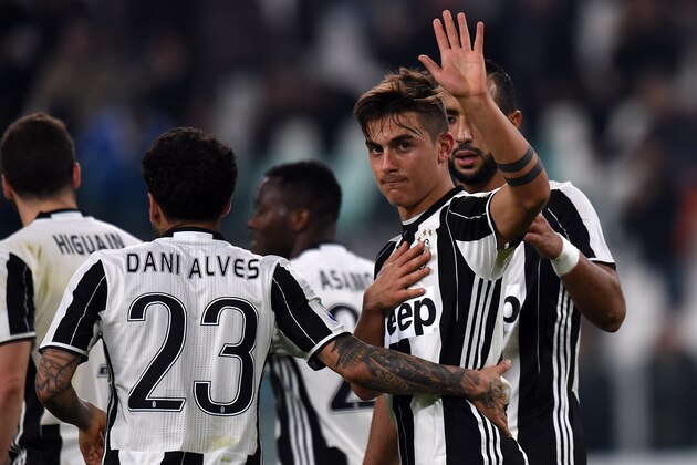 TURIN, ITALY - FEBRUARY 17:  Paulo apologise with fans of Palermo (he was a player of Palermo from 2012 to 2015) after scoring his team's fourth goal during the Serie A match between Juventus FC and US Citta di Palermo at Juventus Stadium on February 17, 2017 in Turin, Italy.  (Photo by Tullio M. Puglia/Getty Images)
