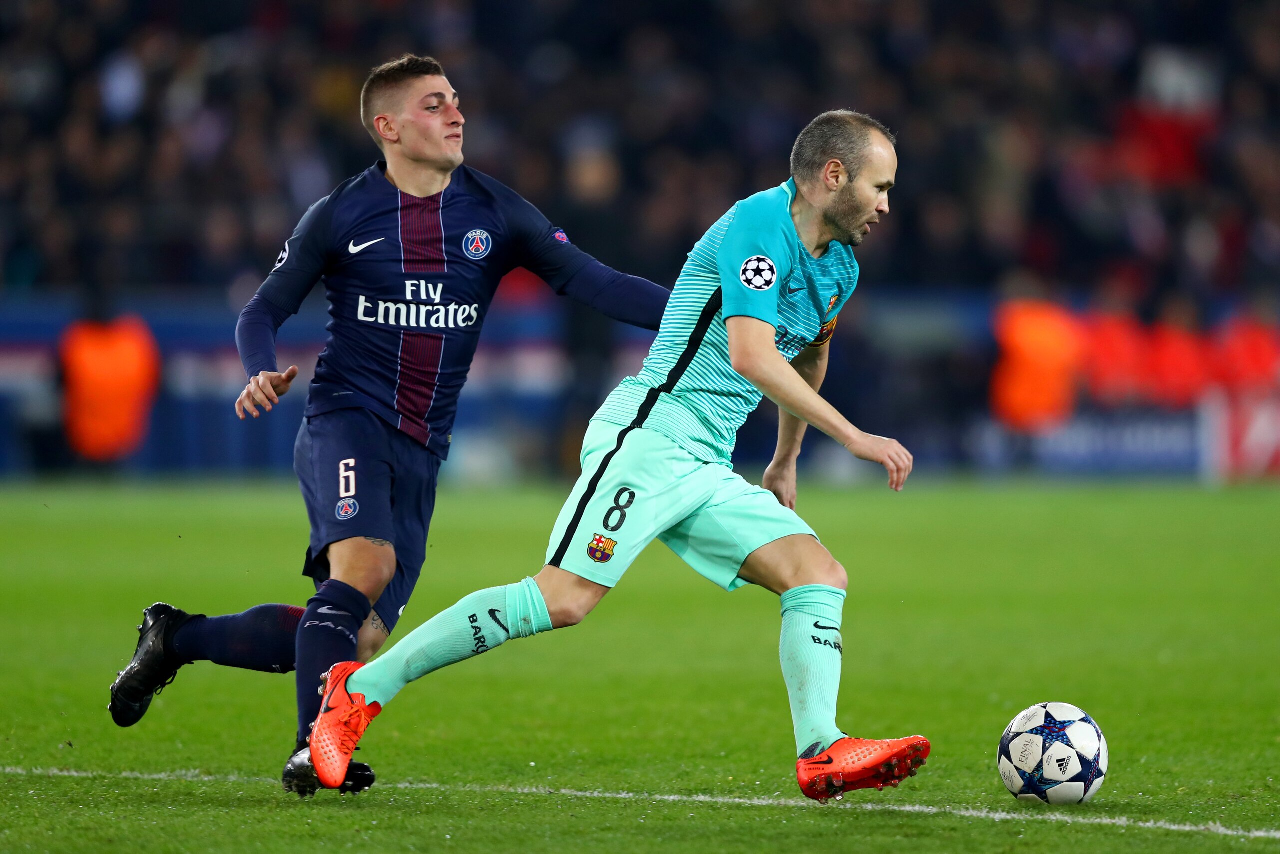 PARIS, FRANCE - FEBRUARY 14: Andres Iniesta of Barcelona battles for the ball with Marco Verratti of Paris Saint-Germain during the UEFA Champions League Round of 16 first leg match between Paris Saint-Germain and FC Barcelona at Parc des Princes on February 14, 2017 in Paris, France. (Photo by Clive Rose/Getty Images) PARIS, FRANCE - FEBRUARY 14: Andres Iniesta of Barcelona battles for the ball with Marco Verratti of Paris Saint-Germain during the UEFA Champions League Round of 16 first leg match between Paris Saint-Germain and FC Barcelona at Parc des Princes on February 14, 2017 in Paris, France. (Photo by Clive Rose/Getty Images)
