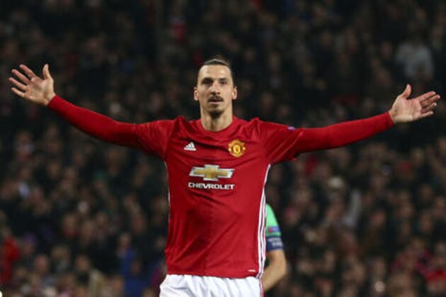 Manchester United's Zlatan Ibrahimovic celebrates after scoring during the Europa League round of 32 first leg soccer match between Manchester United and St.-Etienne at the Old Trafford stadium in Manchester, England, Thursday, Feb. 16, 2017 . (AP Photo/Dave Thompson)