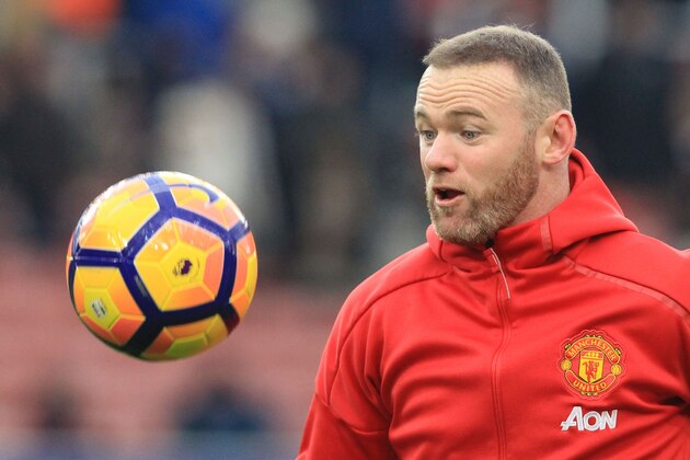 Manchester United's English striker Wayne Rooney warms up ahead of the English Premier League football match between Stoke City and Manchester United at the Bet365 Stadium in Stoke-on-Trent, central England on January 21, 2017. / AFP / Lindsey PARNABY / RESTRICTED TO EDITORIAL USE. No use with unauthorized audio, video, data, fixture lists, club/league logos or 'live' services. Online in-match use limited to 75 images, no video emulation. No use in betting, games or single club/league/player publications.  /         (Photo credit should read LINDSEY PARNABY/AFP/Getty Images)