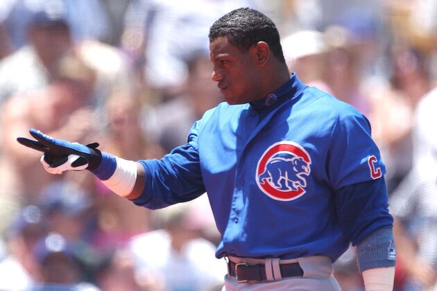 LOS ANGELES, UNITED STATES:  Sammy Sosa of the Chicago Cubs gestures after hitting his 36th homerun of the season in the first inning the Los Angeles Dodgers 04 August 2001 in Los Angeles, CA.  Ths Dodgers won the game, 3-1. AFP PHOTO/Vince BUCCI (Photo credit should read Vince Bucci/AFP/Getty Images)