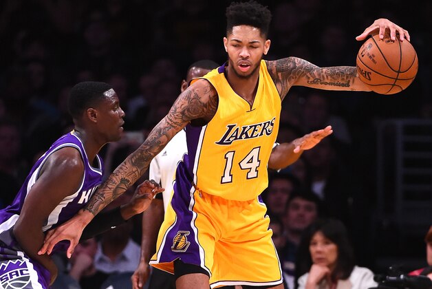 LOS ANGELES, CA - FEBRUARY 14: Brandon Ingram #14 of the Los Angeles Lakers is guard by Darren Collison #7 of the Sacramento Kings during the game against at Staples Center on February 14, 2017 in Los Angeles, California. NOTE TO USER: User expressly acknowledges and agrees that, by downloading and or using this photograph, User is consenting to the terms and conditions of the Getty Images License Agreement. (Photo by Jayne Kamin-Oncea/Getty Images)