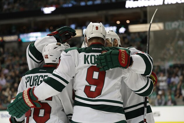 DALLAS, TX - JANUARY 24:  The Minnesota Wild celebrate a goal by Mikko Koivu #9 against the Dallas Stars in the second period at American Airlines Center on January 24, 2017 in Dallas, Texas.  (Photo by Ronald Martinez/Getty Images)