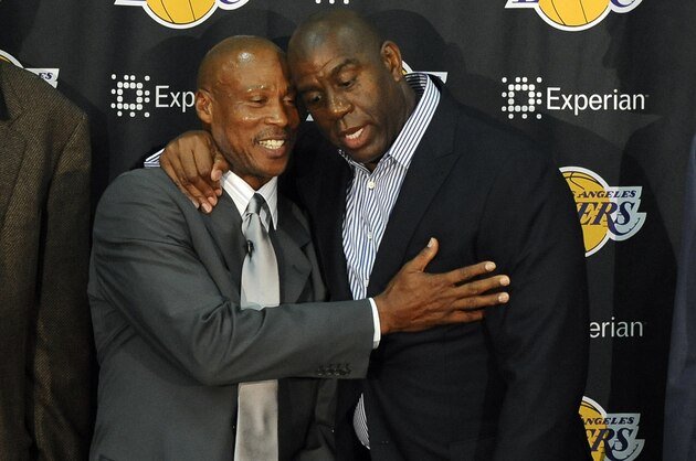 EL SEGUNDO, CA - JULY 29:   (L-R) Jamaal Wilkes, Kareem Abdul-Jabbar, Byron Scott, Earvin 'Magic' Johnson and Mitch Kupchak pose for a picture during a press conference to introduce Byron Scott as the new head coach of the Los Angeles Lakers on July 29, 2014 at Toyota Sports Center in El Segundo, California. NOTE TO USER: User expressly acknowledges and agrees that, by downloading and/or using this photograph, User is consenting to the terms and conditions of Getty Images License Agreement. Mandatory Copyright Notice: Copyright 2014 NBAE (Photo by Juan Ocampo/NBAE via Getty Images)