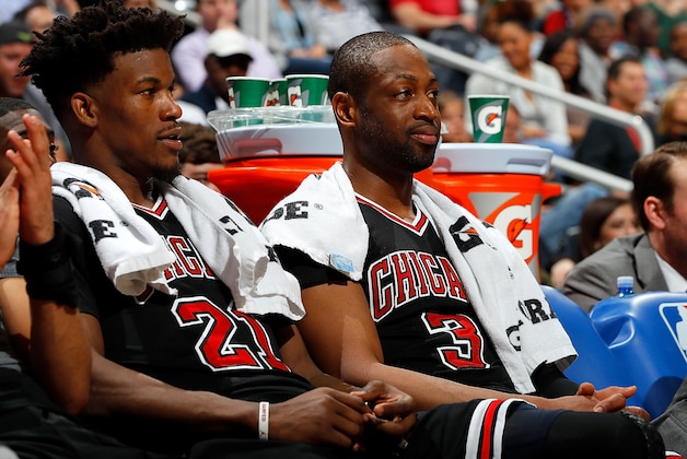 ATLANTA, GA - JANUARY 20:  Jimmy Butler #21 and Dwyane Wade #3 of the Chicago Bulls look on from the bench during the game against the Atlanta Hawks at Philips Arena on January 20, 2017 in Atlanta, Georgia.  NOTE TO USER User expressly acknowledges and agrees that, by downloading and or using this photograph, user is consenting to the terms and conditions of the Getty Images License Agreement.  (Photo by Kevin C. Cox/Getty Images)