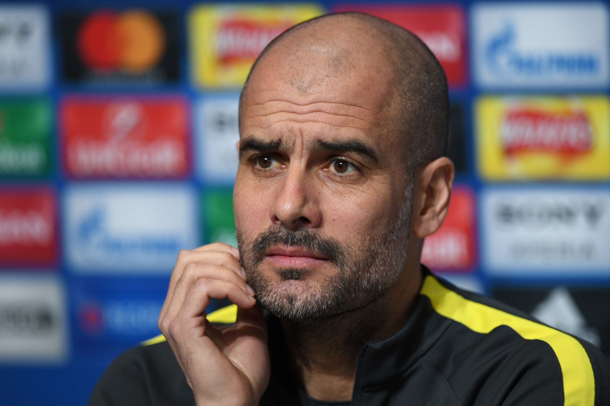 Manchester City's Spanish manager Pep Guardiola addresses the media during a press conference at the City Football Academy in Manchester, northern England, on February 20, 2017, on the eve of their UEFA Champions League Round of 16 first-leg football match against Monaco.  / AFP / Paul ELLIS        (Photo credit should read PAUL ELLIS/AFP/Getty Images)