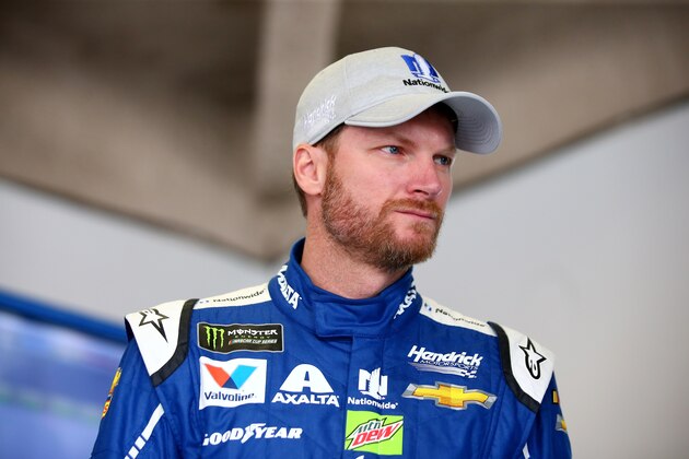 DAYTONA BEACH, FL - FEBRUARY 18:  Dale Earnhardt Jr., driver of the #88 Nationwide Chevrolet, stands in the garage area during practice for the Monster Energy NASCAR Cup Series 59th Annual DAYTONA 500 at Daytona International Speedway on February 18, 2017 in Daytona Beach, Florida.  (Photo by Sarah Crabill/Getty Images)