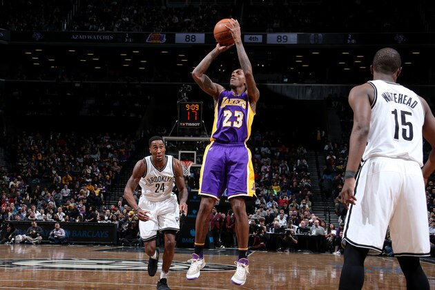 BROOKLYN, NY - December 14: Lou Williams #23 of the Los Angeles Lakers shoots during a game between the Los Angeles Lakers and the Brooklyn Nets on December 14, 2016 at Barclays Center in Brooklyn, NY. NOTE TO USER: User expressly acknowledges and agrees that, by downloading and/or using this Photograph, user is consenting to the terms and conditions of the Getty Images License Agreement. Mandatory Copyright Notice: Copyright 2016 NBAE (Photo by Nathaniel S. Butler/NBAE via Getty Images)
