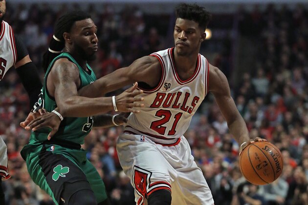 CHICAGO, IL - JANUARY 07: Jimmy Butler #21 of the Chicago Bulls moves against Jae Crowder #99 of the Boston Celtics at the United Center on January 7, 2016 in Chicago, Illinois. NOTE TO USER: User expressly acknowledges and agrees that, by downloading and or using the photograph, User is consenting to the terms and conditions of the Getty Images License Agreement. (Photo by Jonathan Daniel/Getty Images)