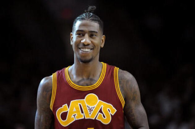 Cleveland Cavaliers guard Iman Shumpert walks onto the court before an NBA basketball game against the Portland Trail Blazers in Portland, Ore., Wednesday, Jan. 11, 2017. (AP Photo/Steve Dykes)