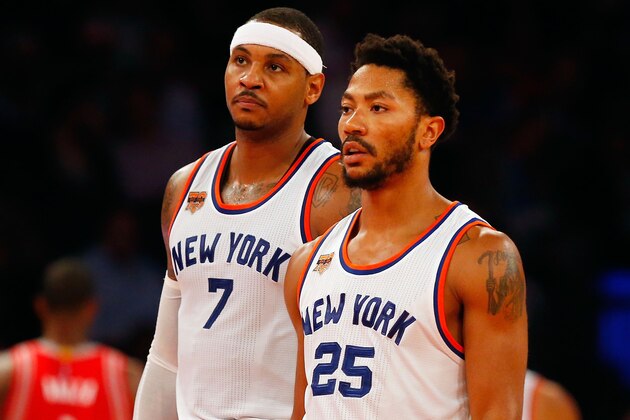 NEW YORK, NY - NOVEMBER 02:  (NEW YORK DAILIES OUT)    Carmelo Anthony #7 and Derrick Rose #25 of the New York Knicks in action against the Houston Rockets at Madison Square Garden on November 2, 2016 in New York City. The Rockets defeated the Knicks 118-99.  NOTE TO USER: User expressly acknowledges and agrees that, by downloading and/or using this Photograph, user is consenting to the terms and conditions of the Getty Images License Agreement.  (Photo by Jim McIsaac/Getty Images)