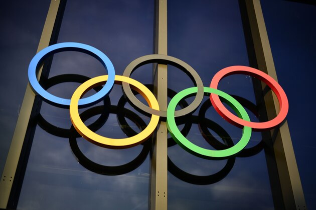 The Olympic rings are seen above the entrance on the facade of the Olympic Museum in Lausanne, Switzerland, on December 7, 2016. / AFP / FABRICE COFFRINI        (Photo credit should read FABRICE COFFRINI/AFP/Getty Images)