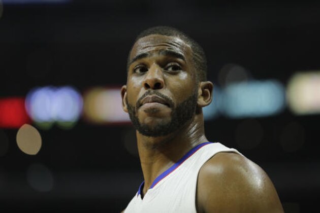 Los Angeles Clippers' Chris Paul looks on during the first half of an NBA basketball game against the Los Angeles Lakers Saturday, Jan. 14, 2017, in Los Angeles. (AP Photo/Jae C. Hong)
