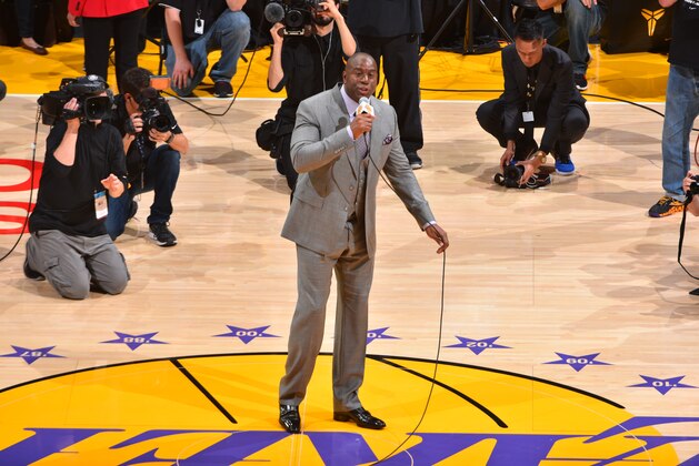 LOS ANGELES, CA - APRIL 13: Hall of famer Magic Johnson of the Los Angeles Lakers addresses the crowd prior to the game against the Utah Jazz on April 13, 2016 at STAPLES Center in Los Angeles, California. NOTE TO USER: User expressly acknowledges and agrees that, by downloading and/or using this Photograph, user is consenting to the terms and conditions of the Getty Images License Agreement. Mandatory Copyright Notice: Copyright 2016 NBAE (Photo by Jesse D. Garrabrant/NBAE via Getty Images)
