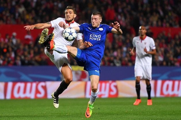 SEVILLE, ENGLAND - FEBRUARY 22:  Jamie Vardy of Leicester City battles for the ball with Daniel Carrico of Sevilla during the UEFA Champions League Round of 16 first leg match between Sevilla FC and Leicester City at Estadio Ramon Sanchez Pizjuan on February 22, 2017 in Seville, Spain.  (Photo by Michael Regan/Getty Images)