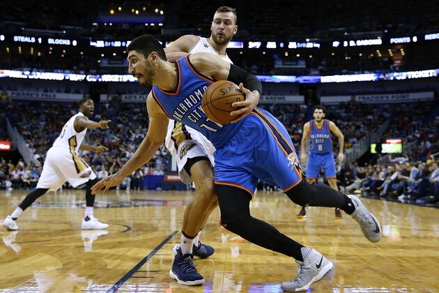 NEW ORLEANS, LA - JANUARY 25: Enes Kanter #11 of the Oklahoma City Thunder drives against Donatas Motiejunas #12 of the New Orleans Pelicans during the second half of a game at the Smoothie King Center on January 25, 2017 in New Orleans, Louisiana. NOTE TO USER: User expressly acknowledges and agrees that, by downloading and or using this photograph, User is consenting to the terms and conditions of the Getty Images License Agreement.  (Photo by Jonathan Bachman/Getty Images)