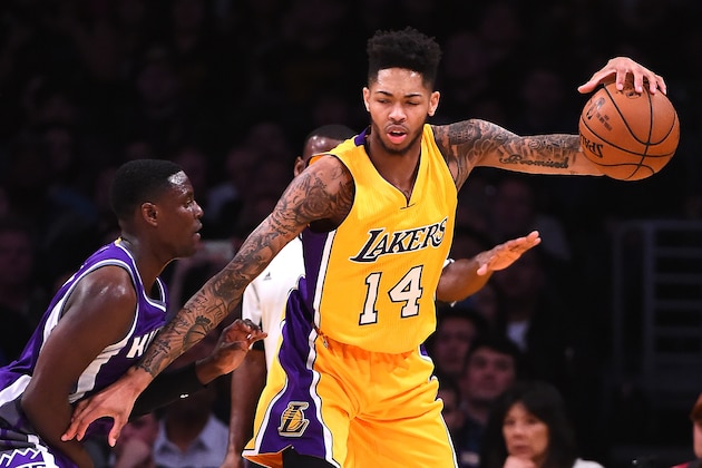 LOS ANGELES, CA - FEBRUARY 14: Brandon Ingram #14 of the Los Angeles Lakers is guard by Darren Collison #7 of the Sacramento Kings during the game against at Staples Center on February 14, 2017 in Los Angeles, California. NOTE TO USER: User expressly acknowledges and agrees that, by downloading and or using this photograph, User is consenting to the terms and conditions of the Getty Images License Agreement. (Photo by Jayne Kamin-Oncea/Getty Images)