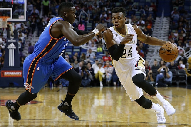 NEW ORLEANS, LA - JANUARY 25: Buddy Hield #24 of the New Orleans Pelicans drives against Victor Oladipo #5 of the Oklahoma City Thunder during the first half of a game at the Smoothie King Center on January 25, 2017 in New Orleans, Louisiana. NOTE TO USER: User expressly acknowledges and agrees that, by downloading and or using this photograph, User is consenting to the terms and conditions of the Getty Images License Agreement.  (Photo by Jonathan Bachman/Getty Images)