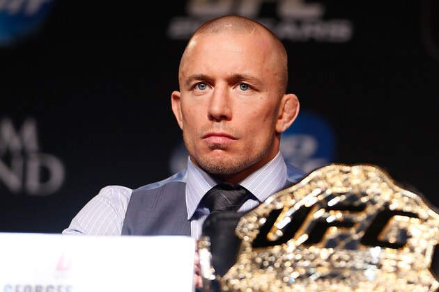 LAS VEGAS, NV - NOVEMBER 14: UFC welterweight champion Georges St-Pierre interacts with media during the final UFC 167 pre-fight press conference inside the Hollywood Theatre at the MGM Grand Hotel/Casino on November 14, 2013 in Las Vegas, Nevada. (Photo by Josh Hedges/Zuffa LLC/Zuffa LLC via Getty Images)
