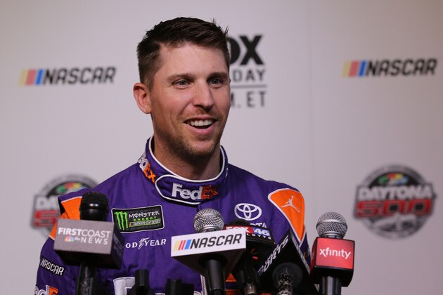 DAYTONA BEACH, FL - FEBRUARY 22:  Denny Hamlin, driver of the #11 FedEx Express Toyota, speaks with the media during the Daytona 500 Media Day at Daytona International Speedway on February 22, 2017 in Daytona Beach, Florida.  (Photo by Jerry Markland/Getty Images)
