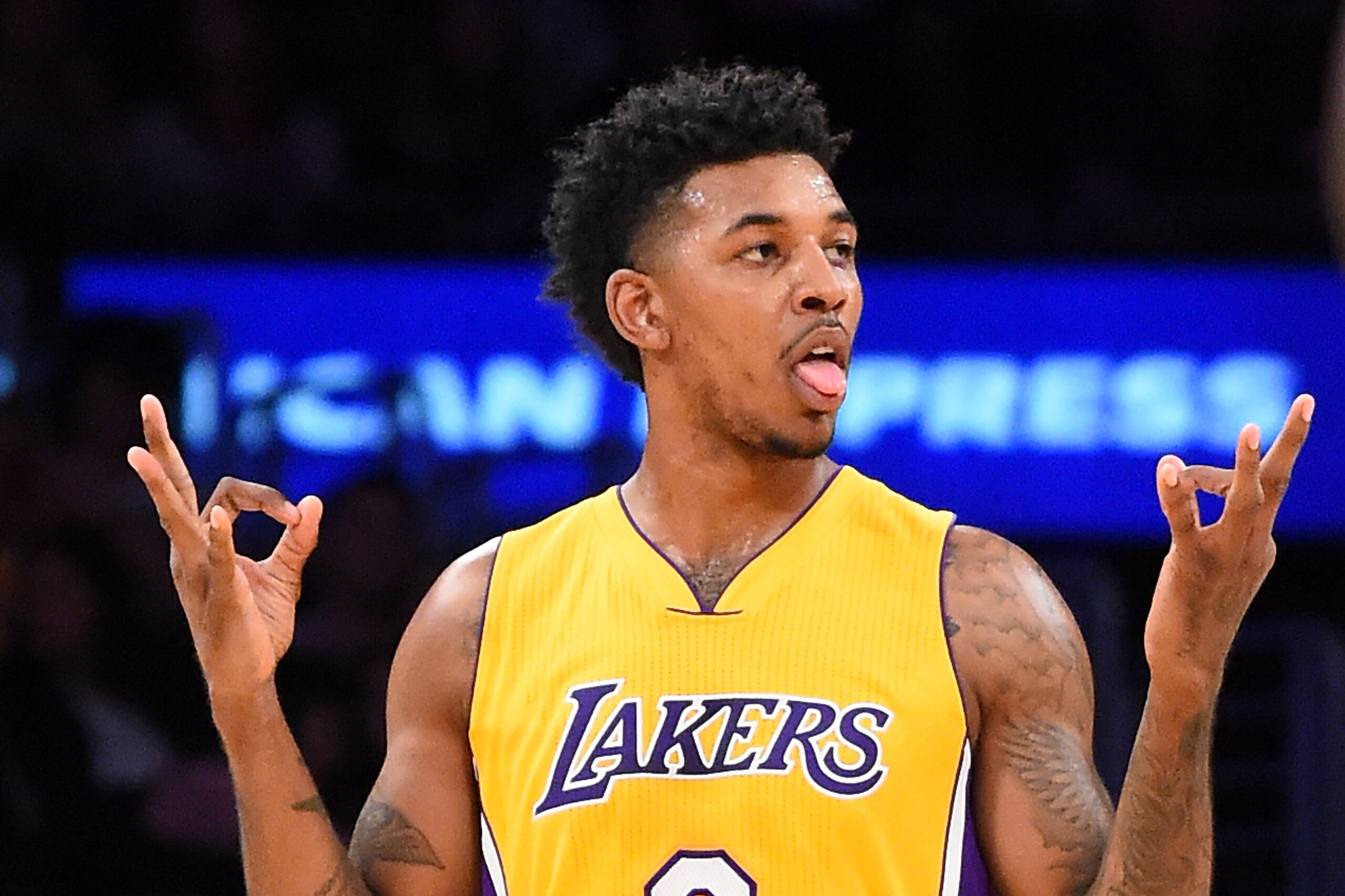 LOS ANGELES, CA - FEBRUARY 14:   Nick Young #0 of the Los Angeles Lakers gestures after a three-point basket in the first half of the game against the Sacramento Kings at Staples Center on February 14, 2017 in Los Angeles, California. NOTE TO USER: User expressly acknowledges and agrees that, by downloading and or using this photograph, User is consenting to the terms and conditions of the Getty Images License Agreement. (Photo by Jayne Kamin-Oncea/Getty Images)