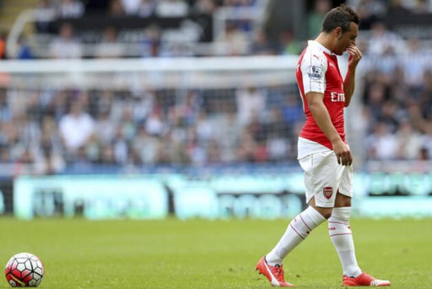 FILE- In this Saturday, Aug. 29, 2015 file photo, Arsenal's Santi Cazorla during their English Premier League soccer match between Newcastle United and Arsenal at St James' Park, Newcastle, England. Cazorla will be out for around three months because of a right ankle injury, robbing the team of its creative influence in central midfield.  (AP Photo/Scott Heppell, File)