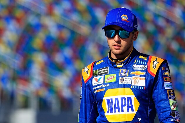 DAYTONA BEACH, FL - FEBRUARY 19:  Chase Elliott, driver of the #24 NAPA Chevrolet, walks on the grid during qualifying for the Monster Energy NASCAR Cup Series 59th Annual DAYTONA 500 at Daytona International Speedway on February 19, 2017 in Daytona Beach, Florida.  (Photo by Cliff Hawkins/Getty Images)