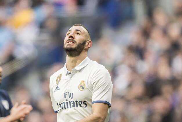 MADRID, SPAIN - JANUARY 21: Karim Benzema of Real Madrid reacts during their La Liga 2016-17 match between Real Madrid and Malaga CF at the Estadio Santiago Bernabéu on 21 January 2017 in Madrid, Spain. (Photo by Power Sport Images/Getty Images)