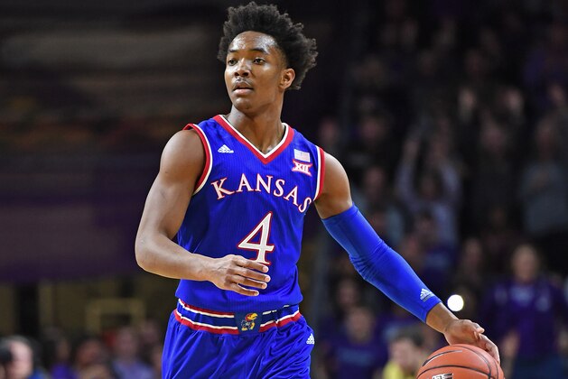 MANHATTAN, KS - FEBRUARY 06:  Guard Devonte Graham #4 of the Kansas Jayhawks brings the ball up the court against the Kansas State Wildcats during the first half on February 6, 2017 at Bramlage Coliseum in Manhattan, Kansas.  (Photo by Peter G. Aiken/Getty Images)