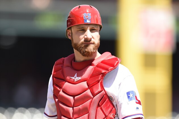 ARLINGTON, TX - AUGUST 14:  Catcher Jonathan Lucroy #25 of the Texas Rangers looks to the dugout during a time out in the game against the Detroit Tigers at Globe Life Park in Arlington on August 14, 2016 in Arlington, Texas. The Detroit Tigers defeated the Texas Rangers 7-0. (Photo by John Williamson/MLB Photos via Getty Images)