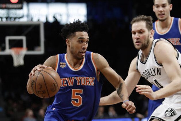 New York Knicks' Courtney Lee (5) drives past Brooklyn Nets' Bojan Bogdanovic (44), of Croatia, during the first half of an NBA basketball game Wednesday, Feb. 1, 2017, in New York. (AP Photo/Frank Franklin II)