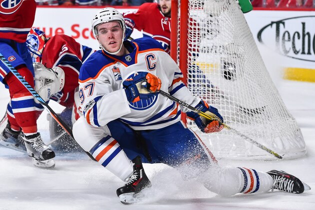 MONTREAL, QC - FEBRUARY 05:  Connor McDavid #97 of the Edmonton Oilers slips during the NHL game against the Montreal Canadiens at the Bell Centre on February 5, 2017 in Montreal, Quebec, Canada.  The Edmonton Oilers defeated the Montreal Canadiens 1-0 in a shootout.  (Photo by Minas Panagiotakis/Getty Images)