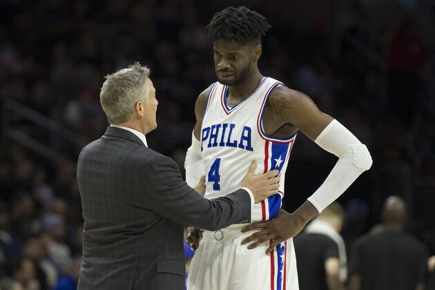 PHILADELPHIA, PA - FEBRUARY 8: Head coach Brett Brown of the Philadelphia 76ers talks to Nerlens Noel #4 during a timeout in the third quarter against the San Antonio Spurs at the Wells Fargo Center on February 8, 2017 in Philadelphia, Pennsylvania. The Spurs defeated the 76ers 111-103. NOTE TO USER: User expressly acknowledges and agrees that, by downloading and or using this photograph, User is consenting to the terms and conditions of the Getty Images License Agreement. (Photo by Mitchell Leff/Getty Images)
