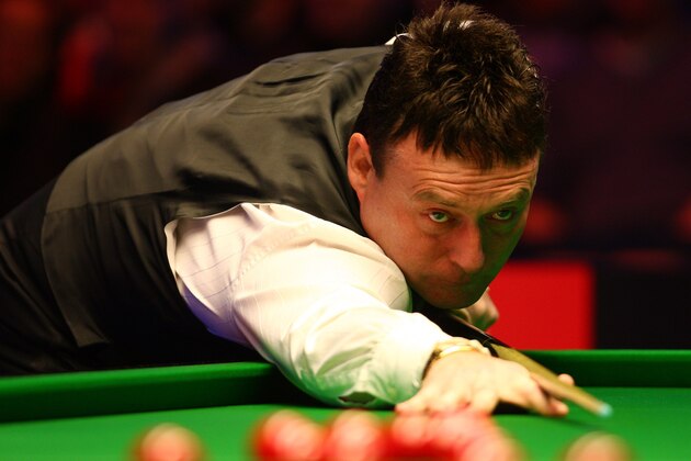 LONDON, ENGLAND - JANUARY 10:  Jimmy White of England lines up a shot during his game against Mark King of England in the PokerStars.com Masters Snooker tournament at Wembley Arena on January 10, 2010 in London, England.  (Photo by John Gichigi/Getty Images)