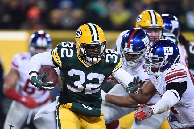 GREEN BAY, WI - JANUARY 08:  Christine Michael #32 of the Green Bay Packers runs for yards against the New York Giants during the NFC Wild Card game at Lambeau Field on January 8, 2017 in Green Bay, Wisconsin.  The Packers defeated the Giants 38-13.  (Photo by Stacy Revere/Getty Images)