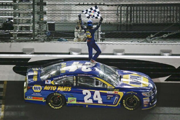 Chase Elliott (24) celebrates in front of grandstand after winning the first of two NASCAR qualifying auto races for Sunday's Daytona 500 at Daytona International Speedway, Thursday, Feb. 23, 2017, in Daytona Beach, Fla. (AP Photo/John Raoux)