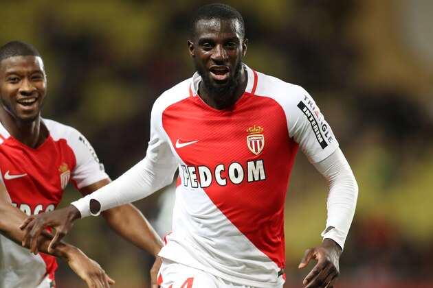Monaco's French midfielder Tiemoue Bakayoko celebrates after scoring a goal during the French L1 football match between Monaco (ASM) and Caen (SMC) on December 21, 2016 at the Louis II Stadium in Monaco. / AFP / VALERY HACHE        (Photo credit should read VALERY HACHE/AFP/Getty Images)