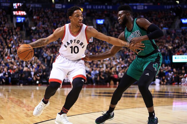 TORONTO, ON - FEBRUARY 24:  DeMar DeRozan #10 of the Toronto Raptors dribbles the ball as Jaylen Brown #7 of the Boston Celtics defends during an NBA game at Air Canada Centre on February 24, 2017 in Toronto, Canada.  NOTE TO USER: User expressly acknowledges and agrees that, by downloading and or using this photograph, User is consenting to the terms and conditions of the Getty Images License Agreement.  (Photo by Vaughn Ridley/Getty Images)