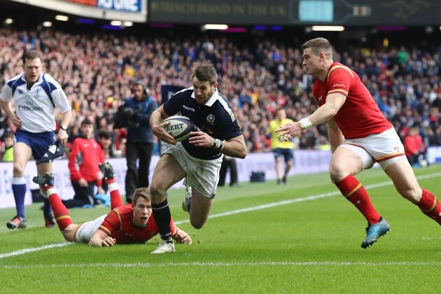 EDINBURGH, SCOTLAND - FEBRUARY 25:  Tommy Seymour of Scotland goes past Liam Williams and Scott Williams of Wales to score his team's first try during the RBS Six Nations match between Scotland and Wales at Murrayfield Stadium on February 25, 2017 in Edinburgh, Scotland.  (Photo by David Rogers/Getty Images)
