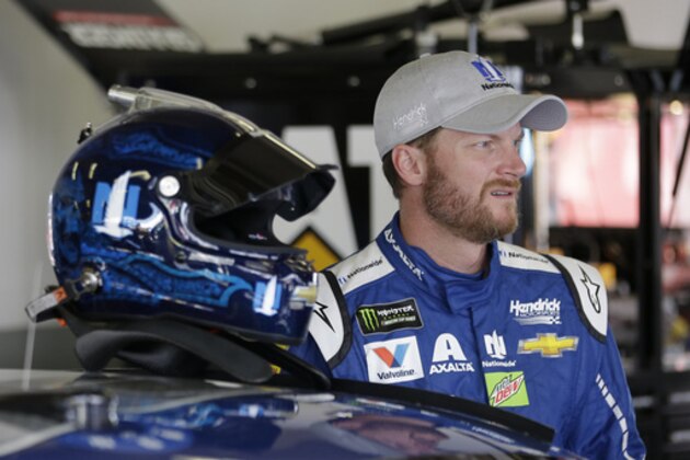 Dale Earnhardt Jr. in his garage during a NASCAR auto racing practice session at Daytona International Speedway, Friday, Feb. 24, 2017, in Daytona Beach, Fla. (AP Photo/John Raoux)