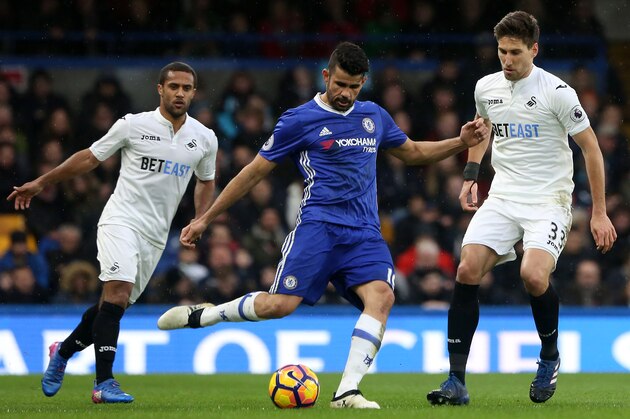 LONDON, ENGLAND - FEBRUARY 25: Diego Costa of Chelsea is challenged by Federico Fernández of Swansea City during the Barclays Premier League match between Chelsea and Swansea City at Stamford Bridge on February 25, 2017 in London, England. (Photo by Athena Pictures/Getty Images)