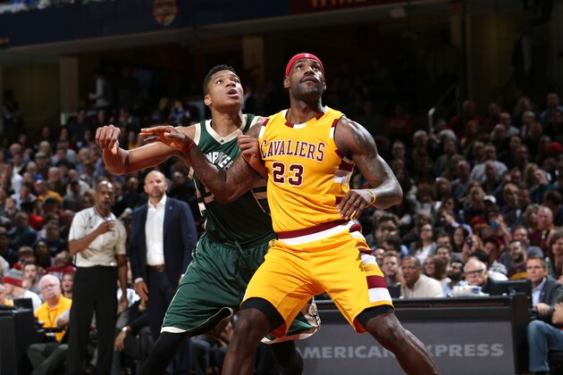 CLEVELAND, OH - NOVEMBER 19: LeBron James #23 of the Cleveland Cavaliers and Giannis Antetokounmpo #34 of the Milwaukee Bucks fight for the position during the game on November 19, 2015 at Quicken Loans Arena in Cleveland, Ohio. NOTE TO USER: User expressly acknowledges and agrees that, by downloading and/or using this Photograph, user is consenting to the terms and conditions of the Getty Images License Agreement. Mandatory Copyright Notice: Copyright 2014 NBAE (Photo by Gary Dineen/NBAE via Getty Images)