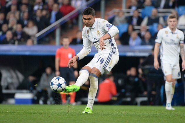 MADRID, SPAIN - FEBRUARY:  Casemiro, #14 of Real Madrid during the UEFA Champions League Round of 16 first leg match between Real Madrid CF and SSC Napoli at  Santiago Bernabeu on February 15, 2017 in Madrid, Spain. (Photo by Sonia Canada/Getty Images)