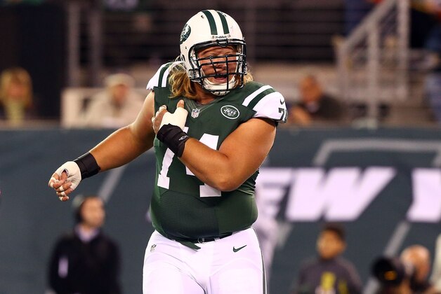 EAST RUTHERFORD, NJ - OCTOBER 08:  (NEW YORK DAILIES OUT)   Nick Mangold #74 of the New York Jets in action against the Houston Texans at MetLife Stadium on October 8, 2012 in East Rutherford, New Jersey. The Texans defeated the Jets 23-17.  (Photo by Jim McIsaac/Getty Images)