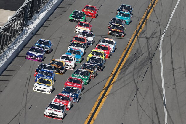 DAYTONA BEACH, FL - FEBRUARY 25:  Brad Keselowski, driver of the #22 Discount Tire Ford, leads a pack of cars during the NASCAR XFINITY Series PowerShares QQQ 300 at Daytona International Speedway on February 25, 2017 in Daytona Beach, Florida.  (Photo by Brian Lawdermilk/Getty Images)