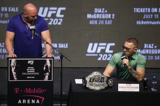 LAS VEGAS, NV - JULY 07: (L to R) UFC President Dana White looks on as Conor McGregor answers questions from the media at the UFC 202 press conference at the T-Mobile Arena on July 7, 2016 in Las Vegas, Nevada. (Photo by Ed Mulholland/Zuffa LLC/Zuffa LLC via Getty Images)